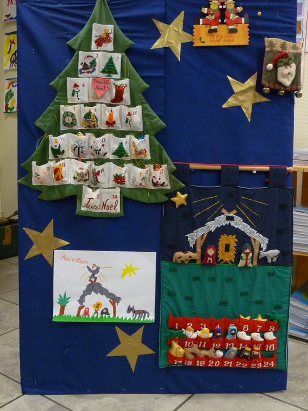 Chaque jour un enfant est tiré au sort pour manger le petit chocolat du jour et ajouter un personnage de la crèche en tissu. Chaque jour un enfant est tiré au sort pour manger le petit chocolat du jour et ajouter un personnage de la crèche en tissu.